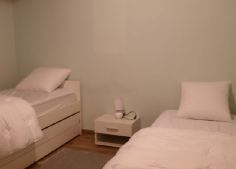 Camera da letto con due letti singoli